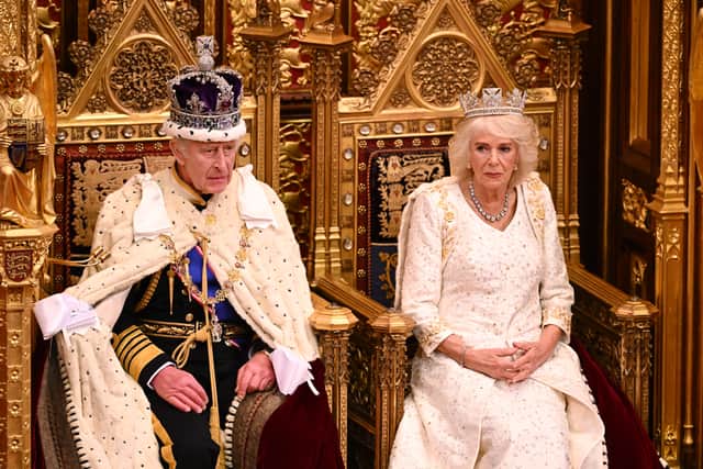 King Charles and Queen Camilla arrive for the start of the State Opening of Parliament in the House of Lords Chamber, the first King's Speech in 70 years. (Credit: Getty Images)