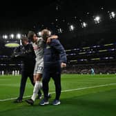 Tottenham Hotspur's Dutch defender #37 Micky van de Ven leaves the pitch injured during the English Premier League football match (Photo by GLYN KIRK/AFP via Getty Images)