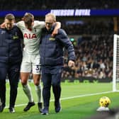 Micky van de Ven of Tottenham Hotspur is substituted after going down with an injury during
