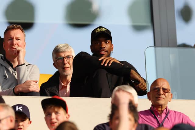 Ivan Toney of Brentford looks on from the stand after the Premier League match