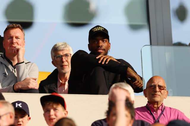  Ivan Toney of Brentford looks on from the stand after the Premier League match