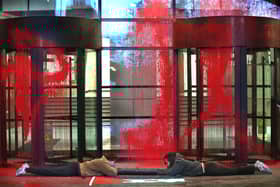 Activists from Palestine Action lock themselves together outside the Thales' London headquarters