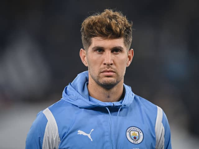 John Stones of Manchester City looks on before the UEFA Champions League