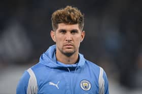 John Stones of Manchester City looks on before the UEFA Champions League