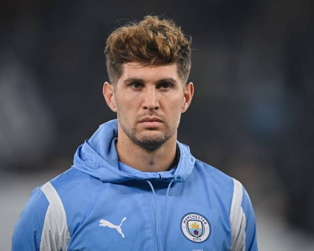 John Stones of Manchester City looks on before the UEFA Champions League