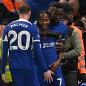 Chelsea's English midfielder #07 Raheem Sterling (C) celebrates with teammates after scoring their second goal during the English Premier League football match between Chelsea and Manchester City