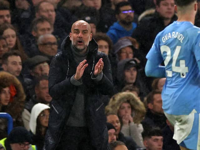Manchester City's Spanish manager Pep Guardiola gestures on the touchline during the English Premier League football match between Chelsea and Manchester City