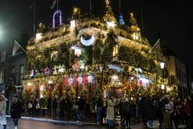 The big switch on of 150,000 LED lights on the 55 Christmas trees on the outside of the Churchill Arms in Kensington, west London. (Photo by Tony Kershaw/SWNS)