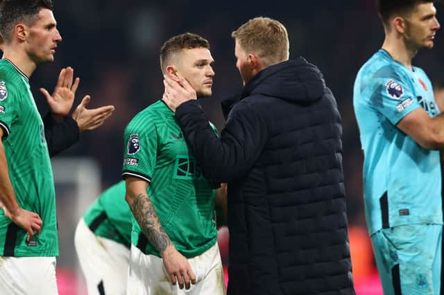  Kieran Trippier of Newcastle United is embraced by Eddie Howe, Manager of Newcastle United following the team's defeat during the Premier League match