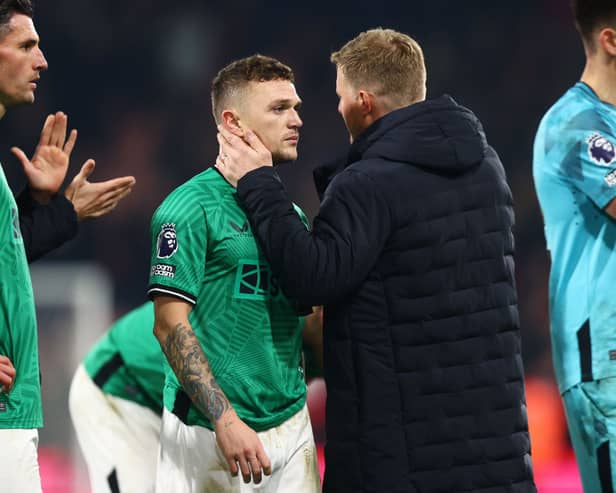  Kieran Trippier of Newcastle United is embraced by Eddie Howe, Manager of Newcastle United following the team's defeat during the Premier League match