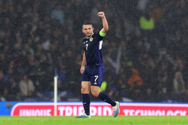John McGinn of Scotland celebrates after scoring the team's first goal from a penalty kick during the UEFA EURO 2024 European qualifier match between Scotland and Norway 