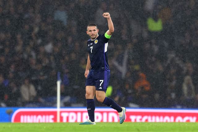 John McGinn of Scotland celebrates after scoring the team's first goal from a penalty kick during the UEFA EURO 2024 European qualifier match between Scotland and Norway