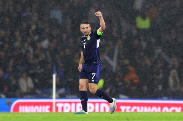 John McGinn of Scotland celebrates after scoring the team's first goal from a penalty kick during the UEFA EURO 2024 European qualifier match between Scotland and Norway 