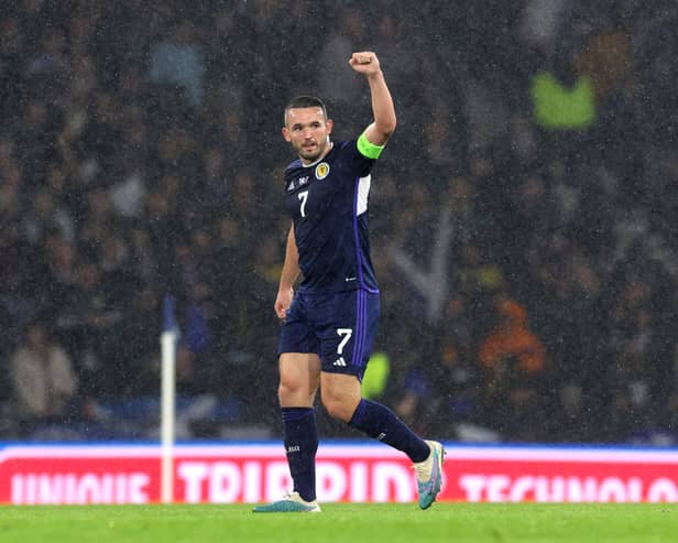 John McGinn of Scotland celebrates after scoring the team's first goal from a penalty kick during the UEFA EURO 2024 European qualifier match between Scotland and Norway 