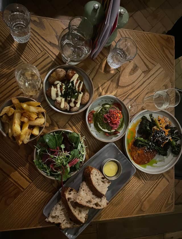 NationalWorld reporter Rochelle Barrand stayed at the Kimpton Clocktower hotel to experience the brand's new Anthropologie partnership. Pictured is the food she and her mum ate for their evening meal at the Refuge dining room. Photo by Rochelle Barrand.