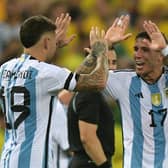 Argentina's defender Nicolas Otamendi (L) celebrates with midfielder Enzo Fernandez after scoring during the 2026 FIFA World Cup South American qualification football match