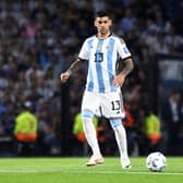 Cristian Romero of Argentina drives the ball during a FIFA World Cup 2026 Qualifier match between Argentina and Uruguay
