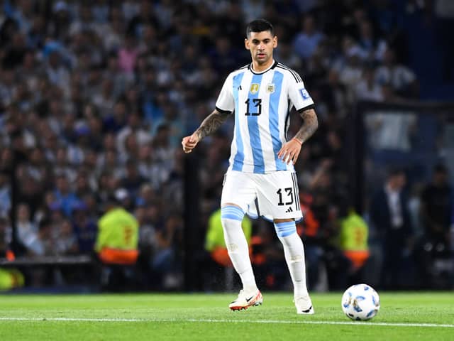 Cristian Romero of Argentina drives the ball during a FIFA World Cup 2026 Qualifier match between Argentina and Uruguay