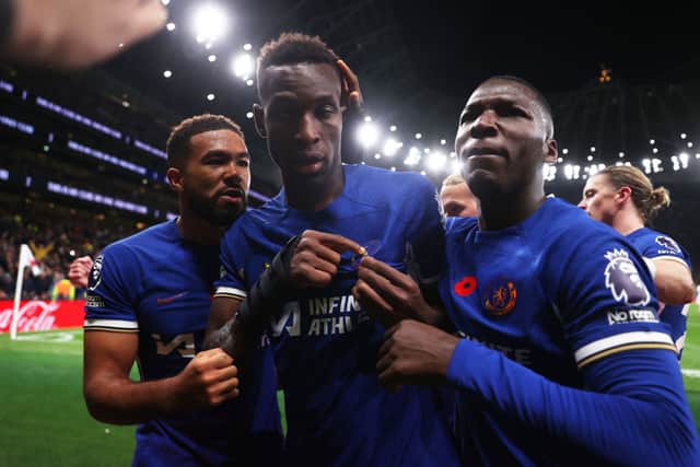 Nicolas Jackson of Chelsea celebrates with teammates Reece James (L) and Moises Caicedo of Chelsea after scoring the team's second goal during the Premier League match