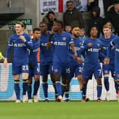 NEWCASTLE UPON TYNE, ENGLAND - NOVEMBER 25: Raheem Sterling of Chelsea celebrates with teammates after scoring the team's first goal during the Premier League match between Newcastle United and Chelsea FC 