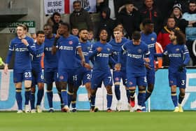 NEWCASTLE UPON TYNE, ENGLAND - NOVEMBER 25: Raheem Sterling of Chelsea celebrates with teammates after scoring the team's first goal during the Premier League match between Newcastle United and Chelsea FC 