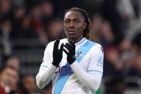 Eberechi Eze of Crystal Palace applauds the fans as he leaves the field after sustaining an injury during the Premier League match 