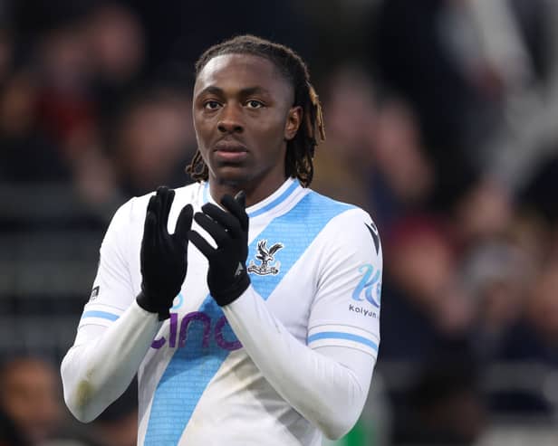 Eberechi Eze of Crystal Palace applauds the fans as he leaves the field after sustaining an injury during the Premier League match 