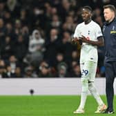 Senegalese midfielder #29 Pape Matar Sarr (C) leaves the game having picked up an injury during the English Premier League football match