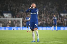 Malo Gusto of Chelsea looks dejected during the Premier League match between Chelsea FC and Arsenal FC at Stamford Bridge 