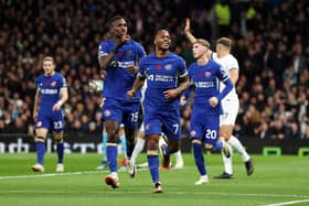 Raheem Sterling of Chelsea celebrates scoring a goal that was later ruled out for handball during the Premier League match between Tottenham Hotspur and Chelsea FC