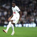 Pape Matar Sarr of Tottenham Hotspur controls the ball during the Premier League match between Tottenham Hotspur and Liverpool FC