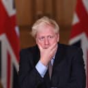 Boris Johnson still hasn't handed over WhatsApp messages from the first lockdown to the Covid Inquiry ahead of his appearance today - but he insisted he did not delete them. (Credit: Getty Images)