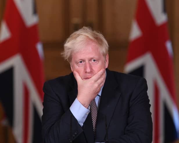 Boris Johnson still hasn't handed over WhatsApp messages from the first lockdown to the Covid Inquiry ahead of his appearance today - but he insisted he did not delete them. (Credit: Getty Images)