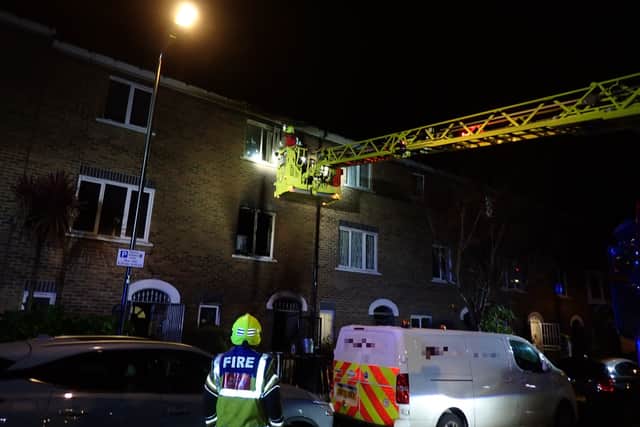 A mother and son were forced to jump out of a window to escape an e-bike fire
