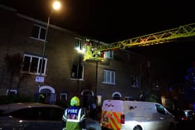 A mother and son were forced to jump out of a window to escape an e-bike fire