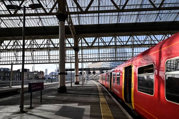 A train stopped at a platform in Waterloo Station. (Photo by JUSTIN TALLIS / AFP via Getty Images)