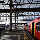 A train stopped at a platform in Waterloo Station. (Photo by JUSTIN TALLIS / AFP via Getty Images)