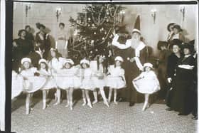 Father Christmas attends the Ballet of Jack Frost and the Snowflakes, during a Christmas Fair in aid of the Royal Free Hospital at the Ritz Hotel in London. (Photo by Hulton Archive/Getty Images)