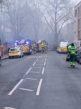 A picture from London Fire Brigade shows large amounts of smoke around the gates of The London Oratory School. (Photo by LFB)
