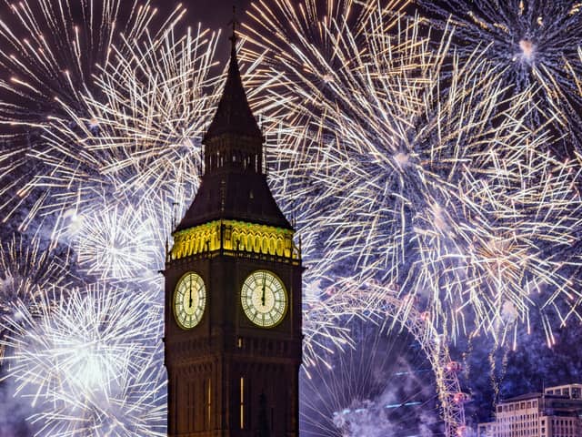 Fireworks in London over Big Ben and the London Eye on January 1 2023. (Photo by Dan Kitwood/Getty Images)