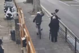 CCTV footage shows a cyclist knocking hats off Jewish men close to a synagogue in Stamford Hill.