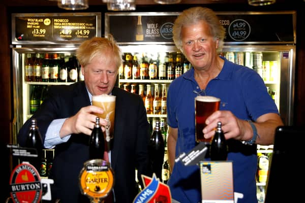 Tim Martin with Boris Johnson in 2019. Credit: Getty