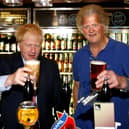 Tim Martin with Boris Johnson in 2019. Credit: Getty