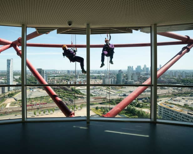 Bankers abseil down the ArcelorMittal Orbit to raise funds for The Royal Marsden Cancer Charity in 2019. (Photo by Getty)