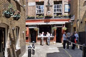 One of the strongest contenders for the difficult-to-confirm title of London’s oldest pub, the Lamb and Flag in Covent Garden was infamous in the 19th century for its bare-knuckle brawls - so much so that it was known to locals as the Bucket of Blood. 
John Dryden was attacked here in 1679. The Poet Laureate was pounced on by masked thugs suspected to have been hired by his rival John Wilmot, the second Earl of Rochester.
Today, the Lamb and Flag, tucked away in Rose Street and Lazenby Court,  is a warm and welcoming old-world establishment with a fantastic range of real ale and classic British pub grub - but do expect to pay Covent Garden prices for a pint.
