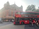A London bus passes the Palace Theatre in London's West End. (Photo by André Langlois)