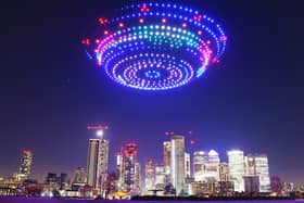 Drones create a 'UFO' above Canary Wharf for Samsung. (Photo by Joe Pepler/PinPep/Samsung)