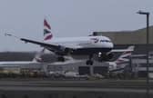 A British Airways Airbus A320neo landing at London Heathrow during Storm Isha's 90mph winds on January 21 2024. (Photo by BIGJET TV / SWNS)