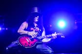 Guns N' Roses guitarist Slash plays a Gibson Les Paul. (Photo by Eduardo VALENTE / AFP via Getty Images)