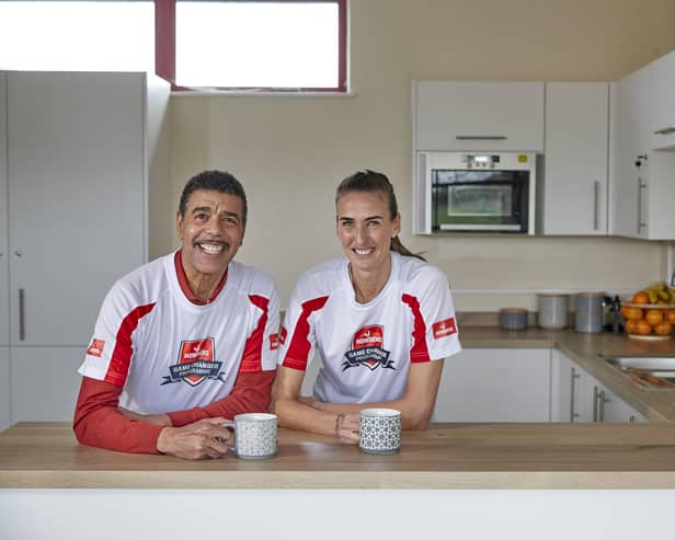 Howdens Game Changer Programme ambassadors Chris Kamara MBE and Jill Scott MBE in a grassroots football club kitchen